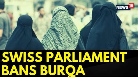 Watch Swiss Parliament Votes To Ban Face Coverings Including Burqas