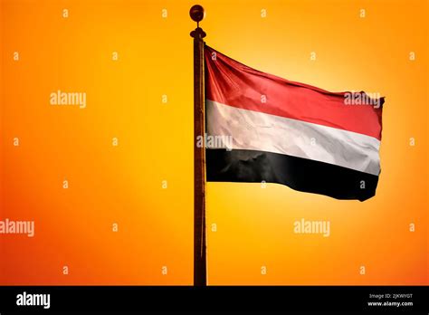 The National Flag Of Yemen With The Movement Of The Wind Is Red White