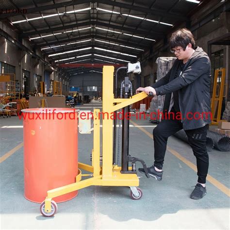 China Manufacturer 450kg Hydraulic Foot Pump Drum Handling Truck