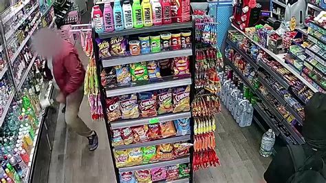 Moment Hero Shopkeeper Springs Across Store To Trap Machete Wielding