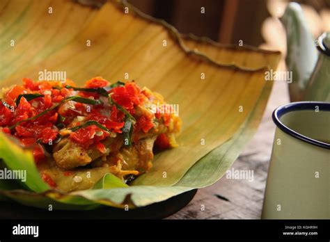 Ayam Balado, Padang Chicken with Crushed Red Chili Peppers Stock Photo - Alamy