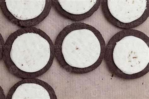 chocolate cookies with creamy cream filling 9717530 Stock Photo at Vecteezy