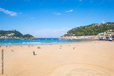 The Beach of La Concha Donostia, a sand beach with shallow waters and tide. It is one of the ...