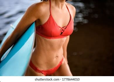 Sexy Tanned Brunette Red Swimsuit Posing Stock Photo