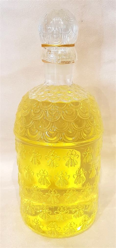 proantic guerlain giant bottle  bees eau de guerlain
