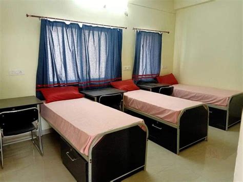 cozy student hostel bedroom   beds