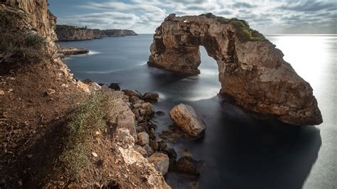 Arch Coast And Ocean Under Cloudy Sky K K Hd Nature Wallpapers Hd