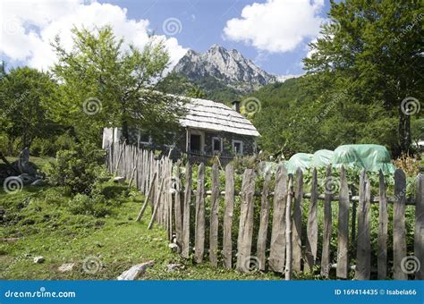 Old Albanian Stone House With Wooden Roof In Village Of Valbona