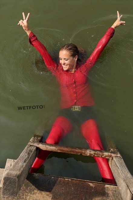 Hot Girl S Wetlook In Red Blouse Denim Shorts Stockings And Boots Wetfoto