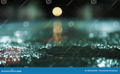 Rain In The City Submerged Road Night Raindrops Close Up Stock