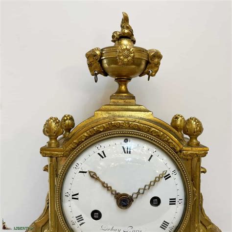 Pendule Louis XVI bronze doré au mercure et marbre blanc signée Debay