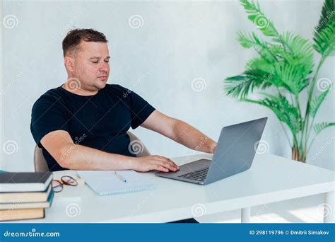 Man Working on Laptop in Office Cabinet Stock Photo - Image of computer ...