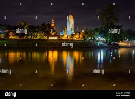 the night view of the Chao Phraya River and Wat Phutthaisawan (Monastery of Buddhist Kingship ...