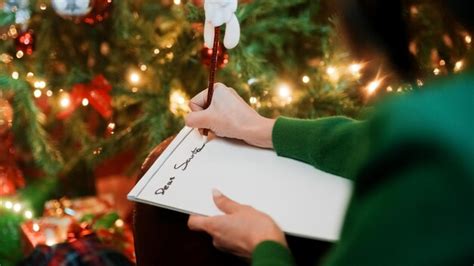 Premium Photo Girl Writes Letter To Santa Claus