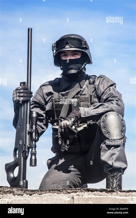 Swat Police Sniper In Black Uniform Stock Photo Alamy