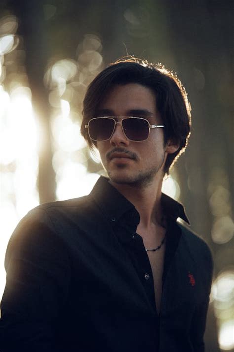stylish young man  sunglasses outdoors  stock photo