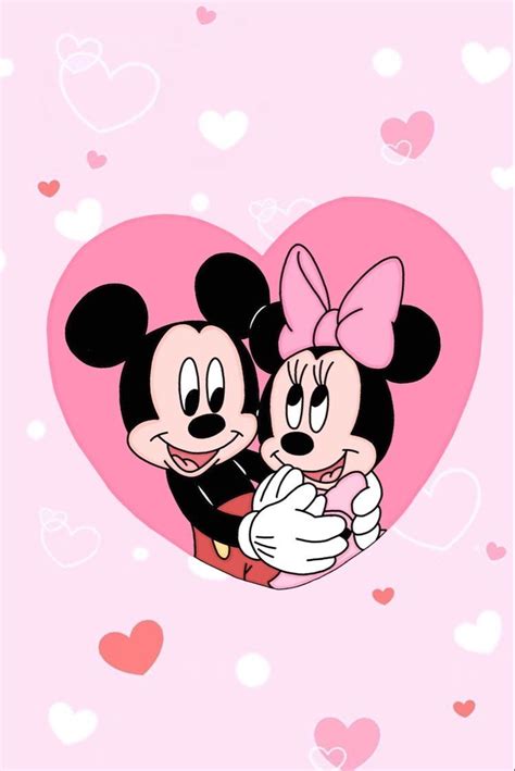 Two Mickey And Minnie Mouses Hugging In Front Of A Heart With Hearts On It