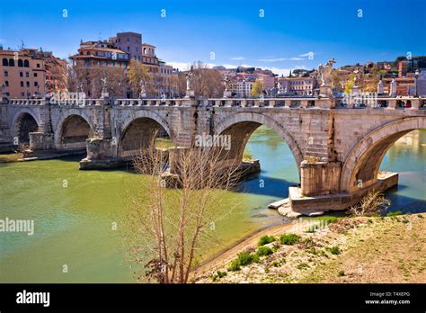 Ancient Ponte Sant Angelo Stone Bridge On Tiber River Of Rome Capital