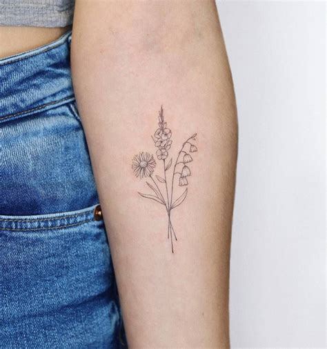 Fine Line Flower Bouquet Tattoo Located On The Inner Bouquet Tattoo