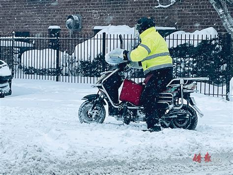 法拉盛商家民众迎战暴风雪 侨报网