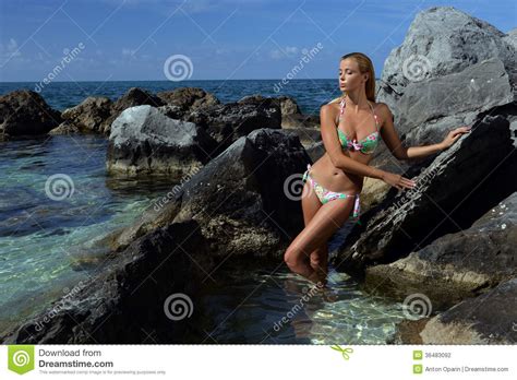 Model In Bikini Posing In Front Of Rocks Stock Photo Image Of Female