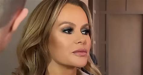 Amanda Holden strips totally naked in risqué video