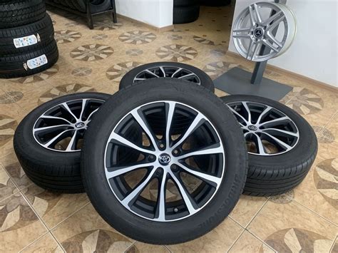 Комплект литих дисків R18 5/114.3 ET45 з шинами 235/55/18 Bridgestone ...