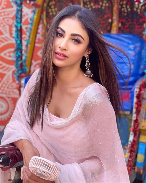 Colorful Beach Photoshoots Of Naagins Actressmouni Roy