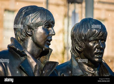 Liverpool UK May 17 2018 Bronze Statue Of The Beatles Stands At The