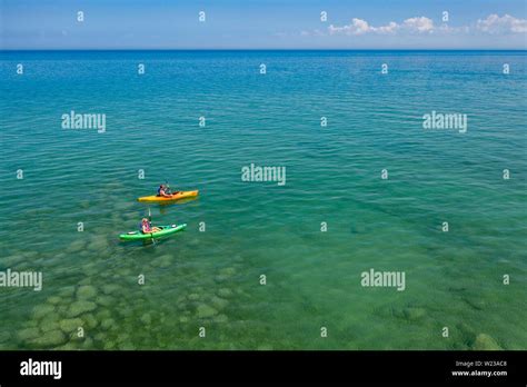 Lexington Michigan Kayakers On Lake Huron Stock Photo Alamy