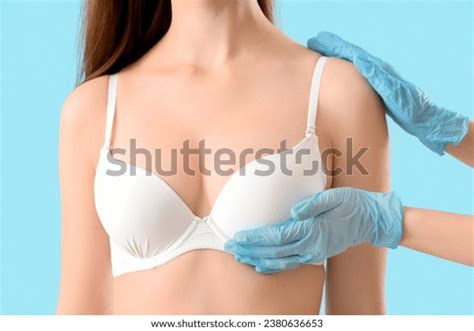 Plastic Surgeon Touching Womans Breast On Stock Photo 2380636653