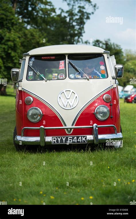 1971 Red White VW Split Screen Volkswagen camper van at a VW show. England Stock Photo - Alamy