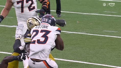 New Orleans Saints cornerback Willie Gay Jr forces Denver Broncos running back Audric Estimé to