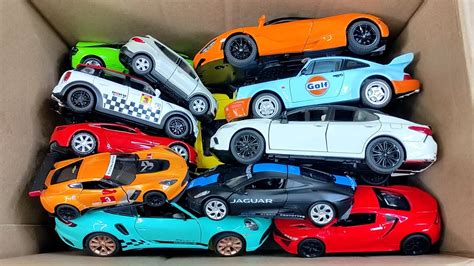 Box Full Of Model Cars Lamborghini Mclaren Lexus Lm H Porsche