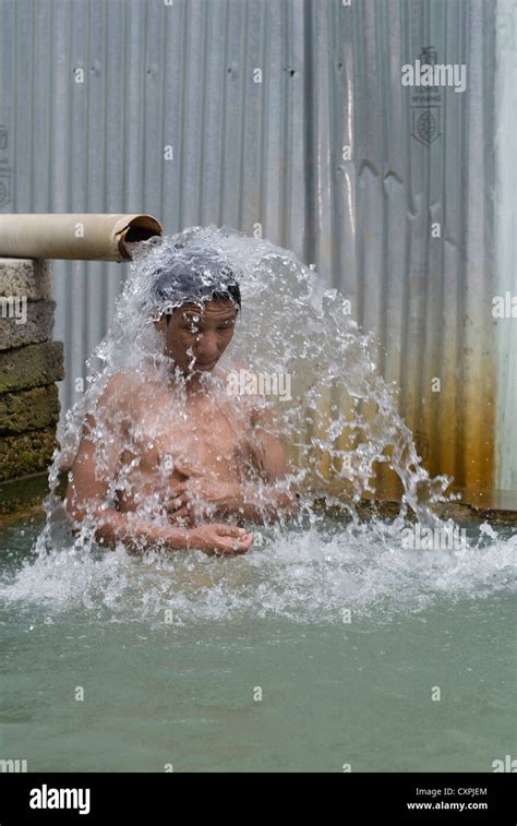 A Man Takes A Bath In A Hot Spring Near Manali North India Stock Photo Alamy