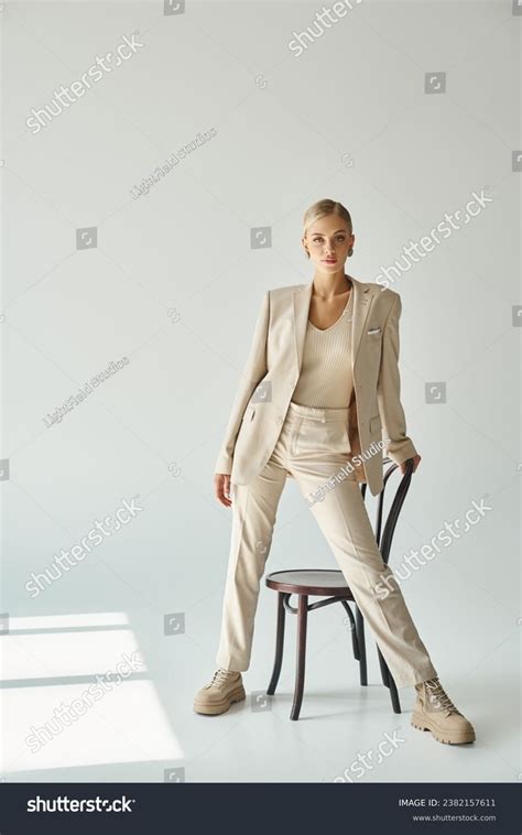 Trendy Blonde Woman Looking Camera While Stock Photo Shutterstock