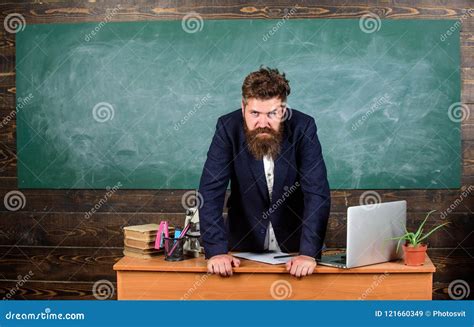 Teacher Strict Serious Bearded Man Lean On Table Chalkboard Background Teacher Looks