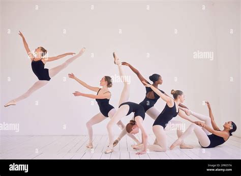 Group of contemporary or ballet dancers performing a unique sequence in ...