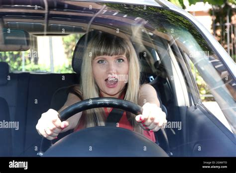 Blonde Woman In Car Stock Photo Alamy