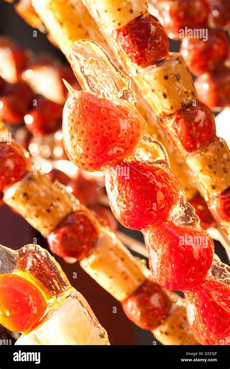 Chinese Traditional Food Sugarcoated Haws On A Stick Stock Photo Alamy