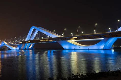 Sheikh Zayed Bridge at night Stock Photo by ©dvoevnore 102699784