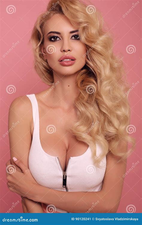 Gorgeous Woman With Blond Curly Hair In Lingerie Posing Stock Image