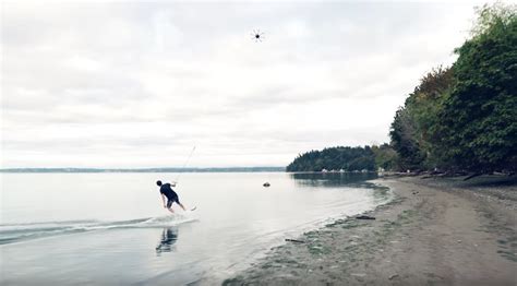 Drone Surfing Video Shows The Coolest Way To Use a Drone We've Seen