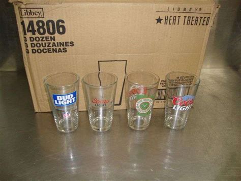 Lot Of 34 16oz Glasses Includes 22 Coors Light And 12 Bud Light Bid