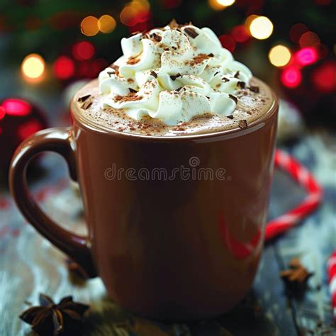Festive Hot Chocolate With Whipped Cream And Cocoa Powder In A Brown