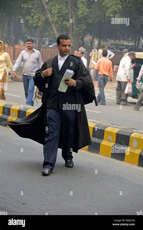 An Indian Lawyer At The Main Entrance To The Supreme Court Of India In