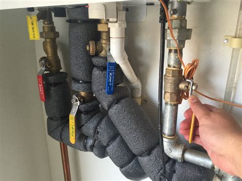 How To Flush A Tankless Water Heater And Clean The Air Intake Filter 7 Steps With Pictures