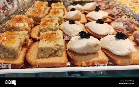 Various Types Of Tapas Displayed On A Counter Stock Photo Alamy