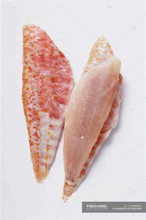 Raw red mullet fillets — gastronomy, marine - Stock Photo | #147980983