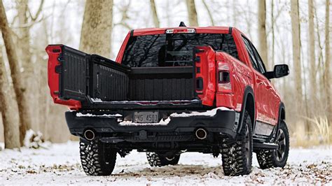 Ram 1500's new tailgate folds and swings for access with or without a ...